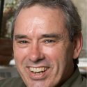 An image of Michael Adang smiling at the camera